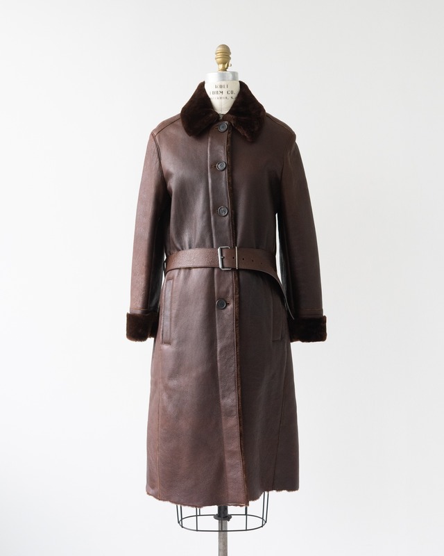 〈PRADA〉Belted Mouton coat