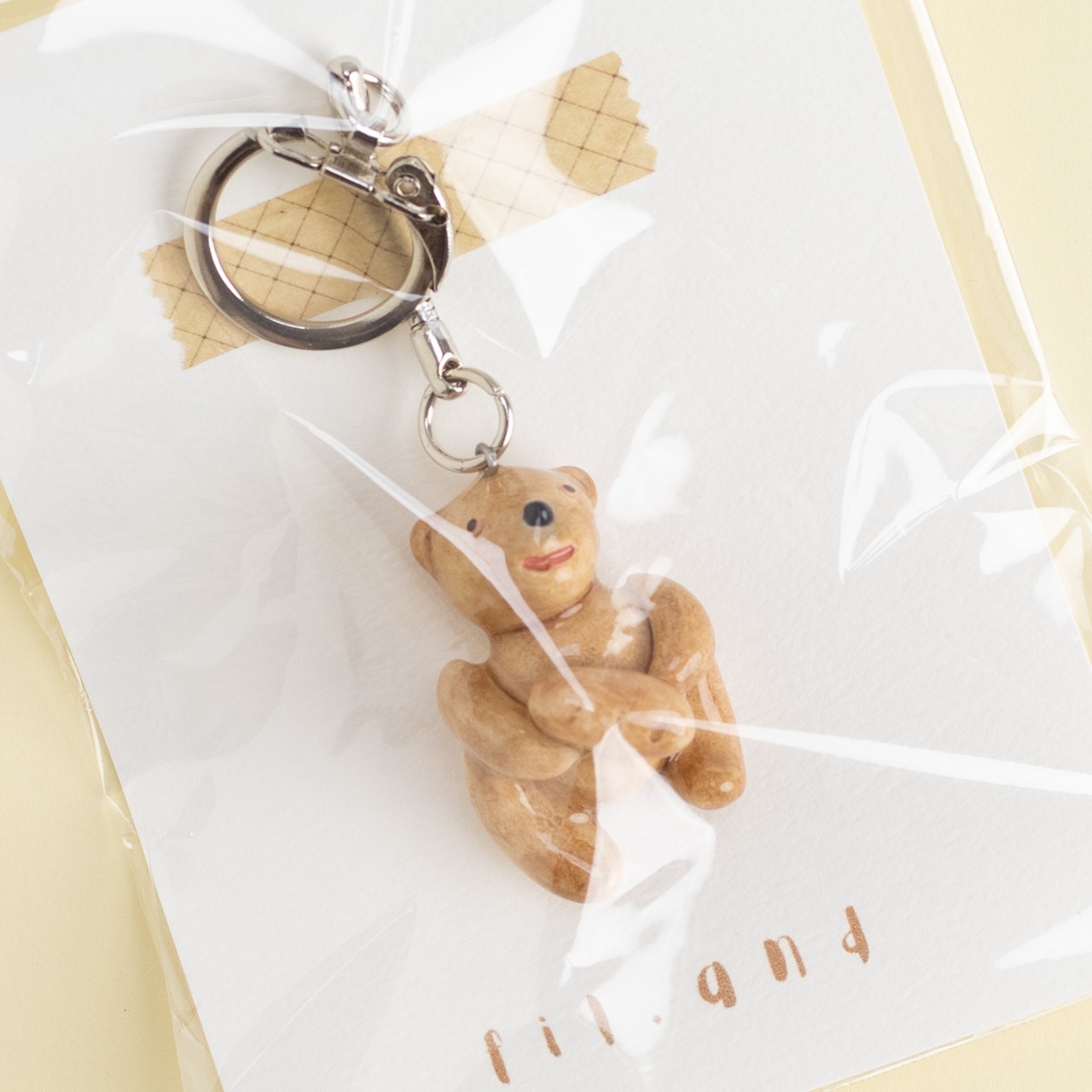 < fil.and > つるつるキーホルダー