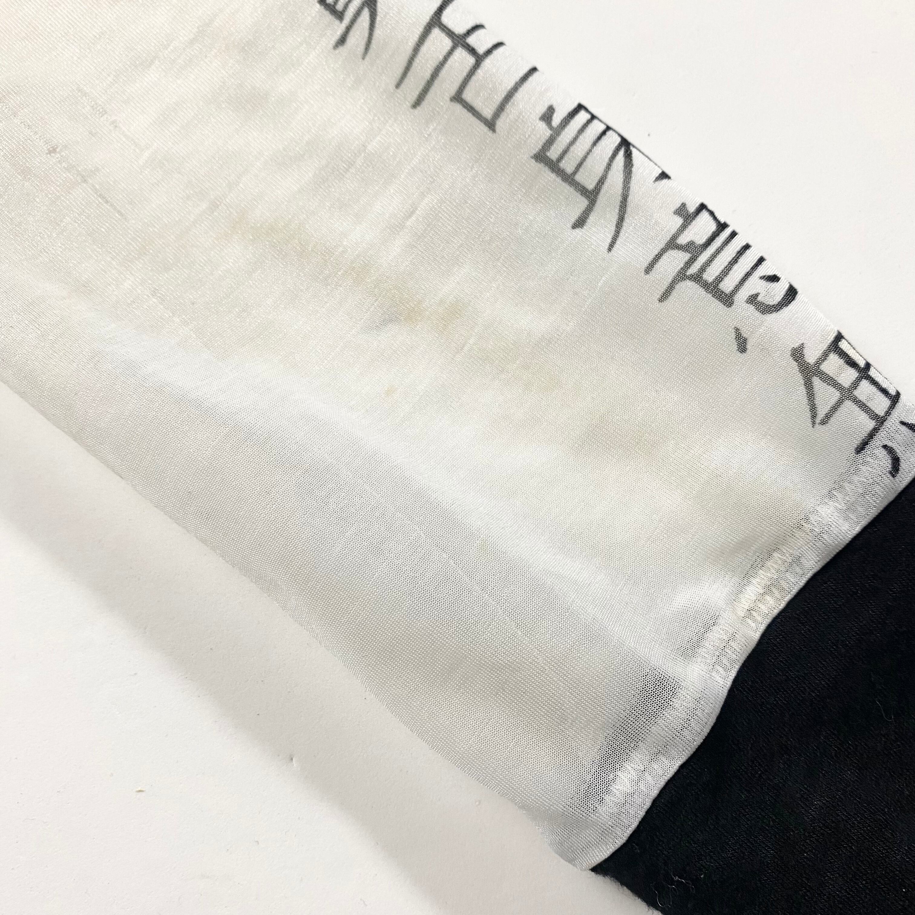 YOHJI YAMAMOTO hi-neck pullover “般若心経” | NOIR ONLINE