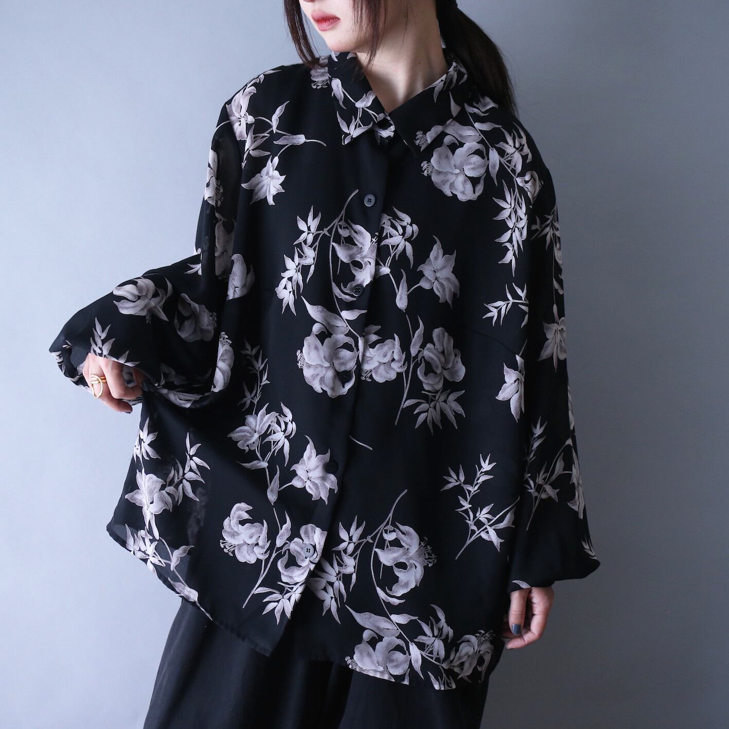 flower art pattern over silhouette black mode see-through shirt