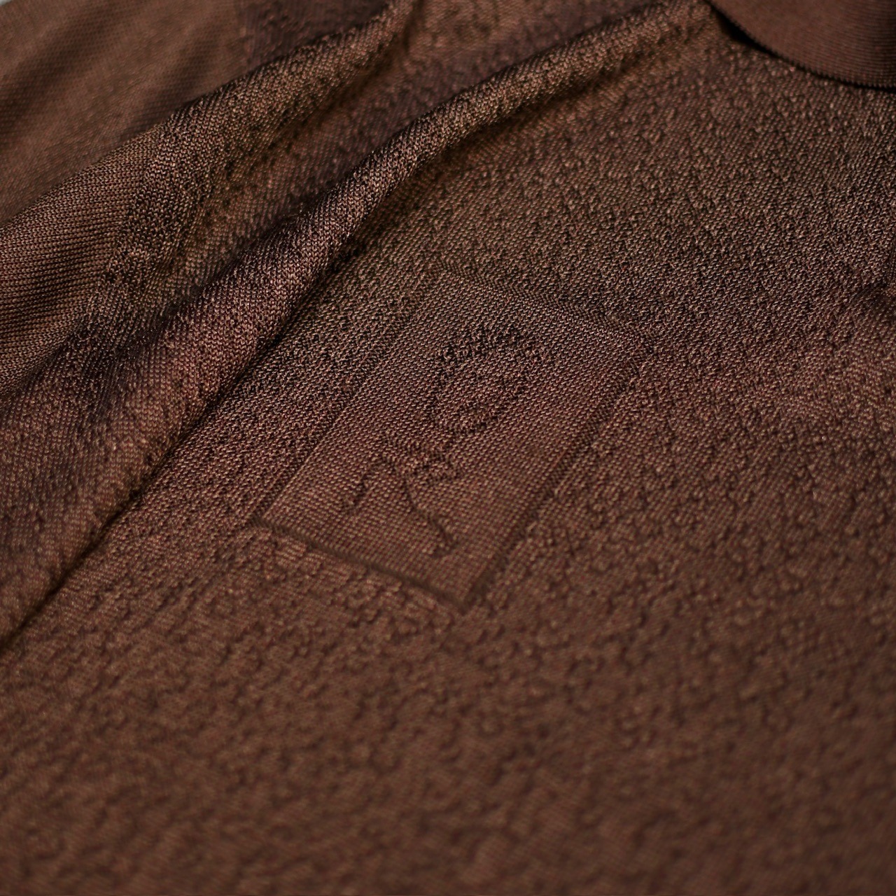 character design knit polo brown