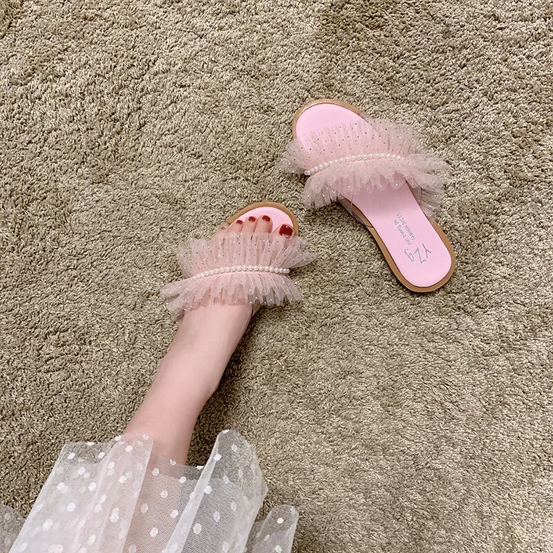 純赤いスリッパの女性は2020年夏の新しいスーパーファイヤーフェアリースタイルのフラットボトム女性のドラッグファッションのレースのサンダルを着用します 部族の婦人靴7412083