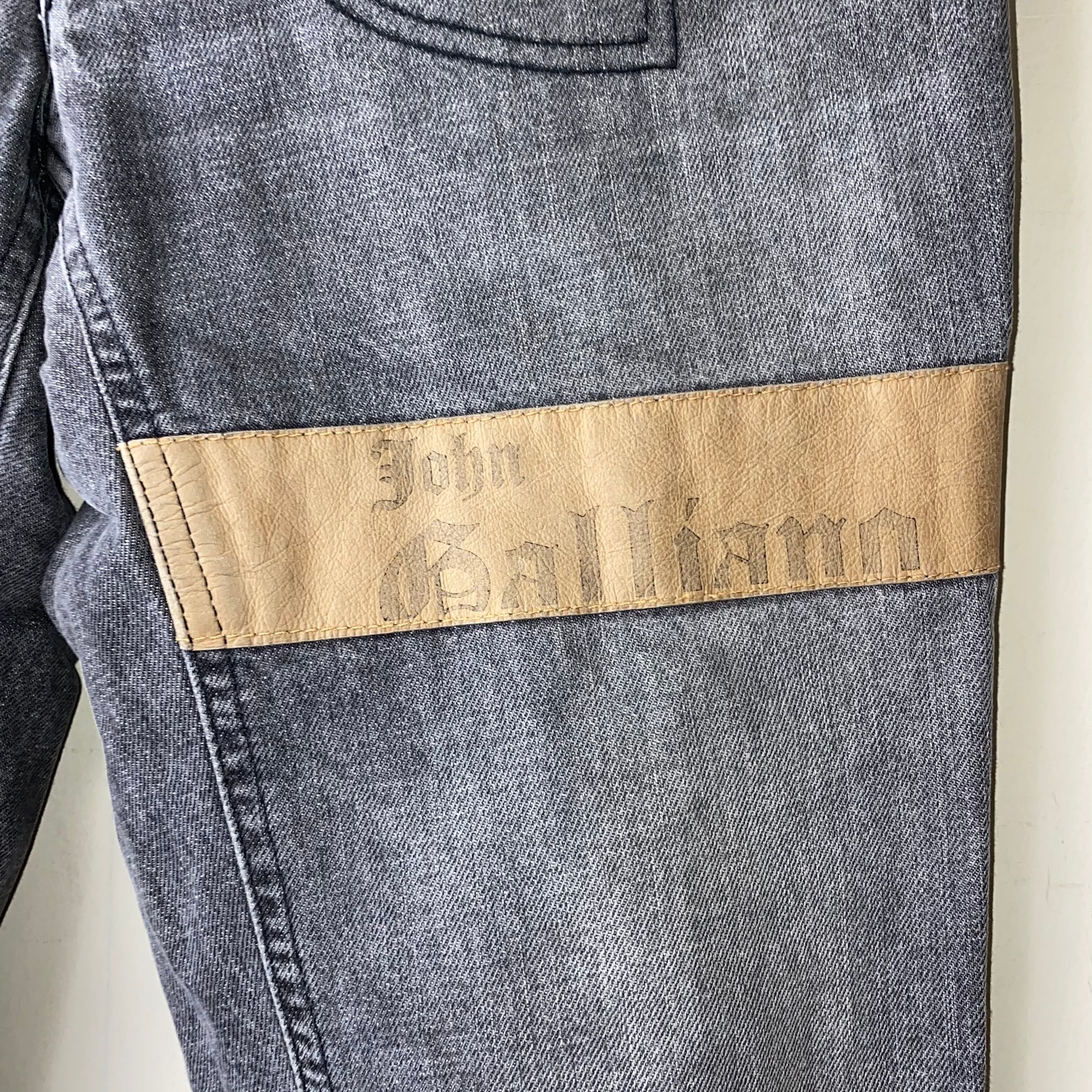 JOHN GALLIANO logo print leather switching faded black denim pants 
