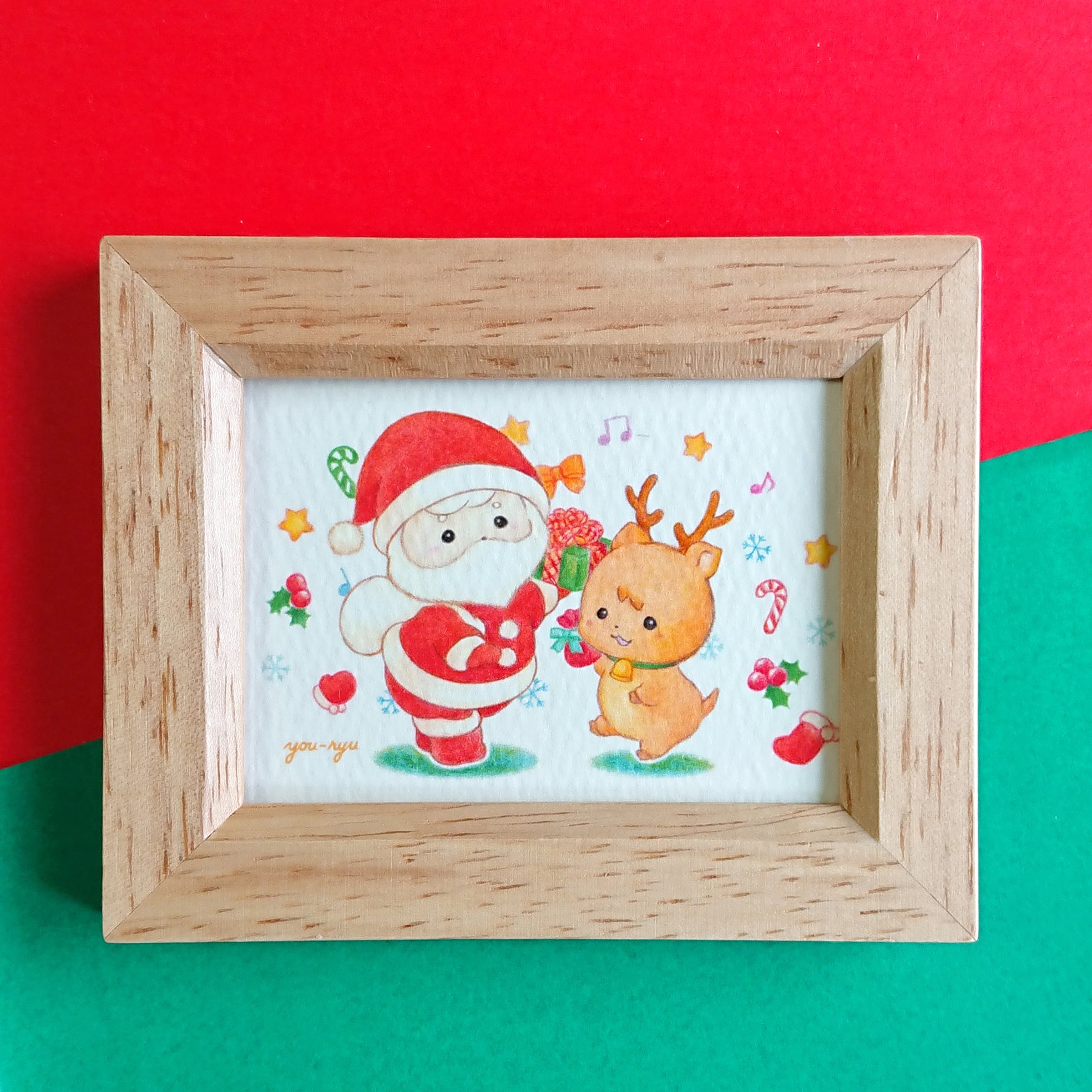 額付ミニイラスト サンタさんとトナカイちゃんのクリスマスダンス ほどけむすび