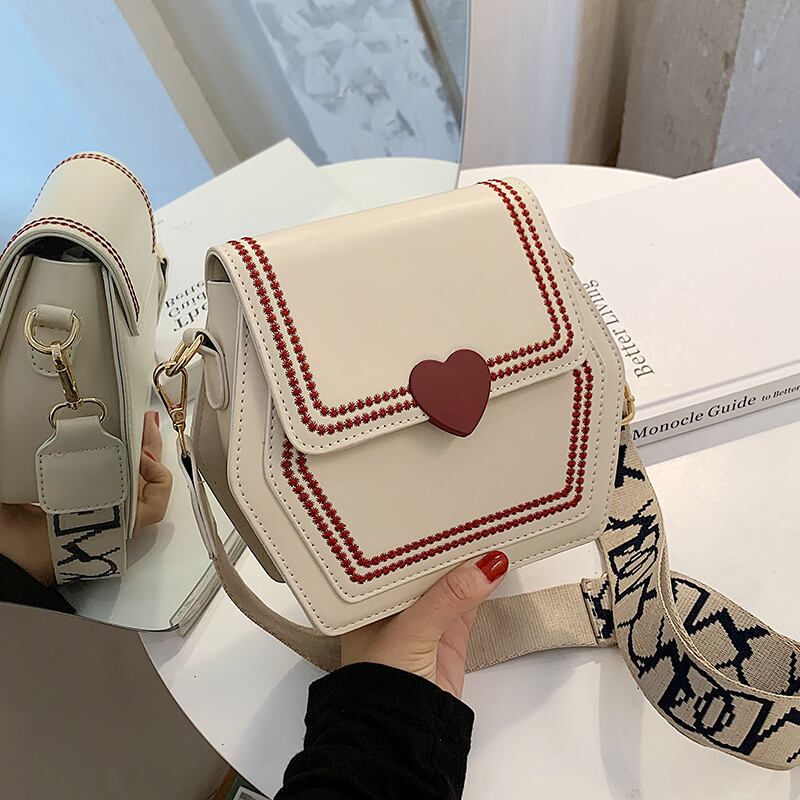 ウエスタンスタイルのセンスの小さなバッグ女性2020野生のファッションブロードバンドショルダーバッグネットレッドメッセンジャーバッグの新しいトレンドバージョン2020 Tiancai_Wing_Bag8130975