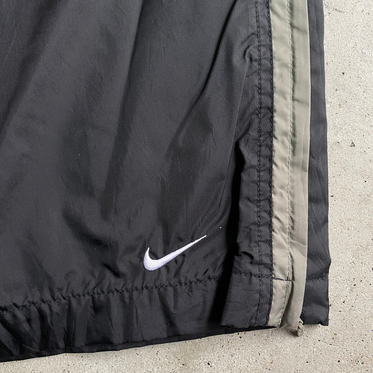 NIKE ナイキ スウォッシュロゴ刺繍 ナイロンパンツ メンズL 古着