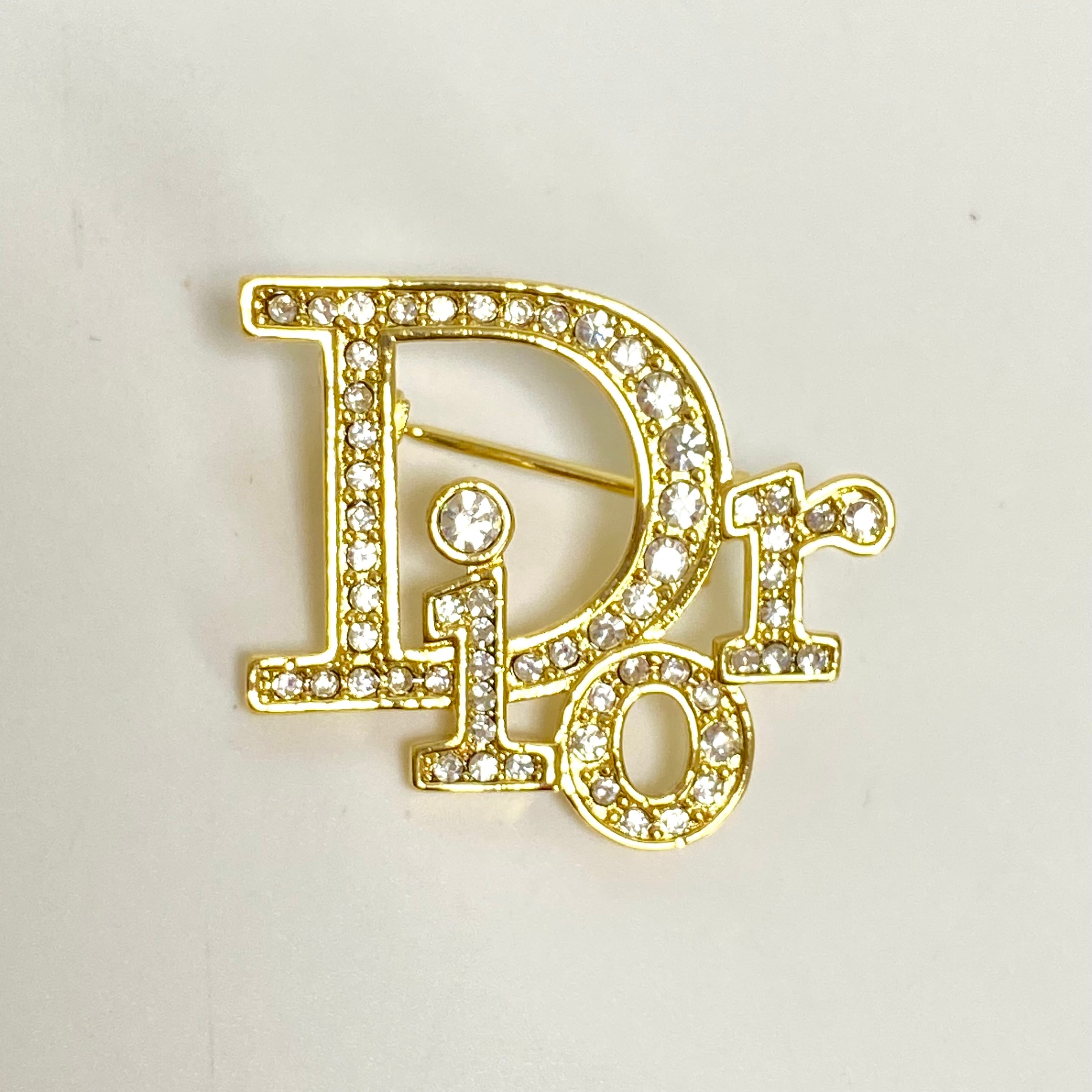 Christian Dior ゴールド　ラインストーン　 Diorロゴ　ブローチ