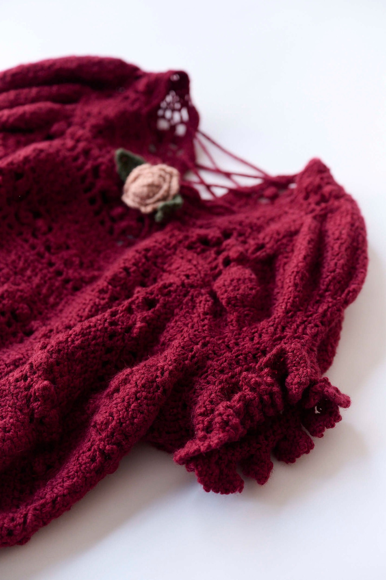 Crochet rose sweater