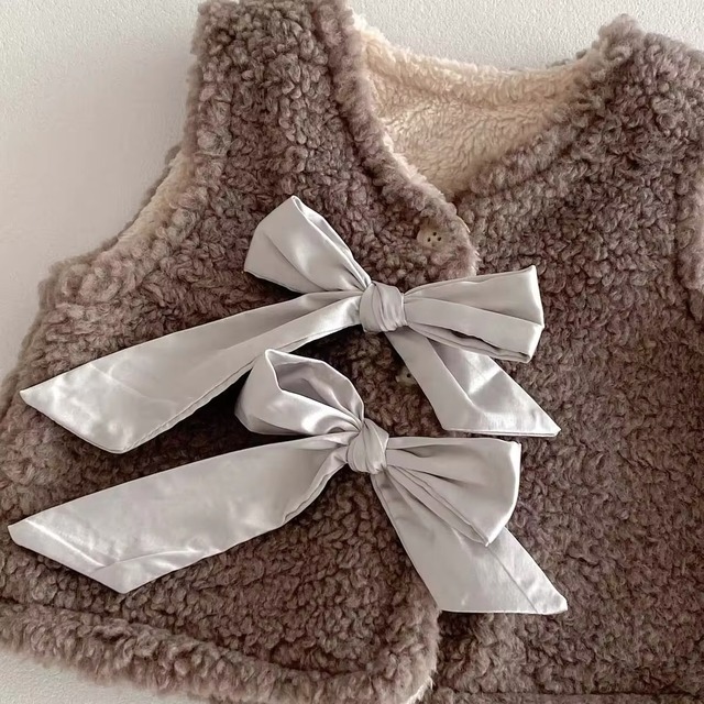 【取寄】トレンドのリボンがポイントのもこもこベスト
