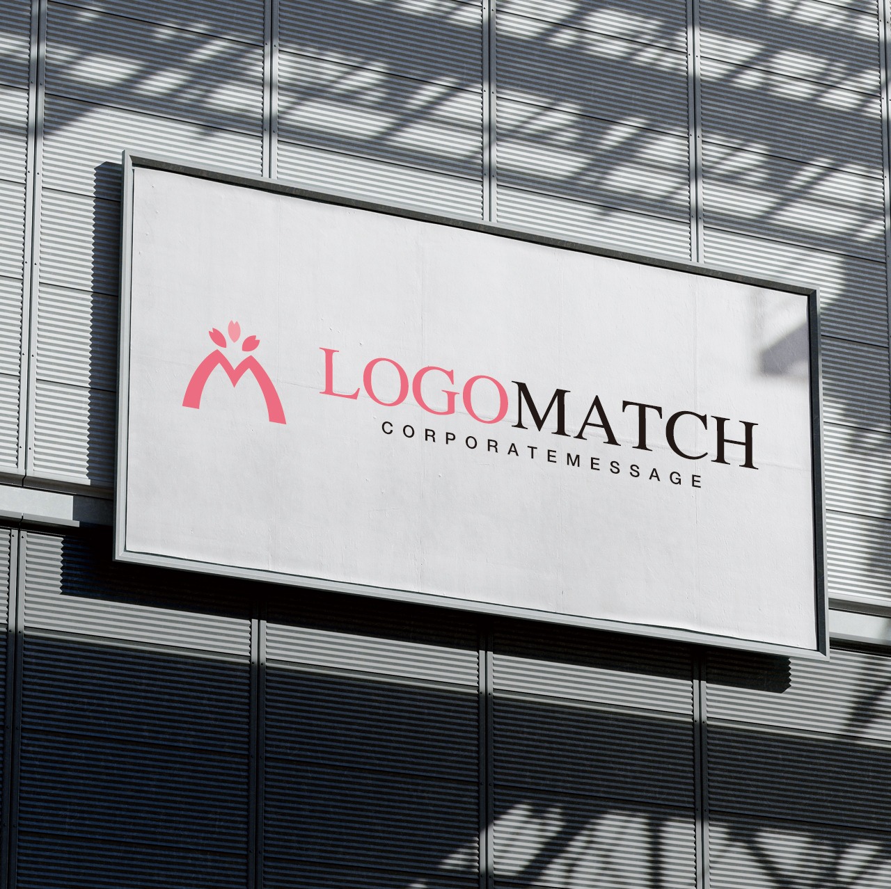 桜の下で握手する人Mのロゴ