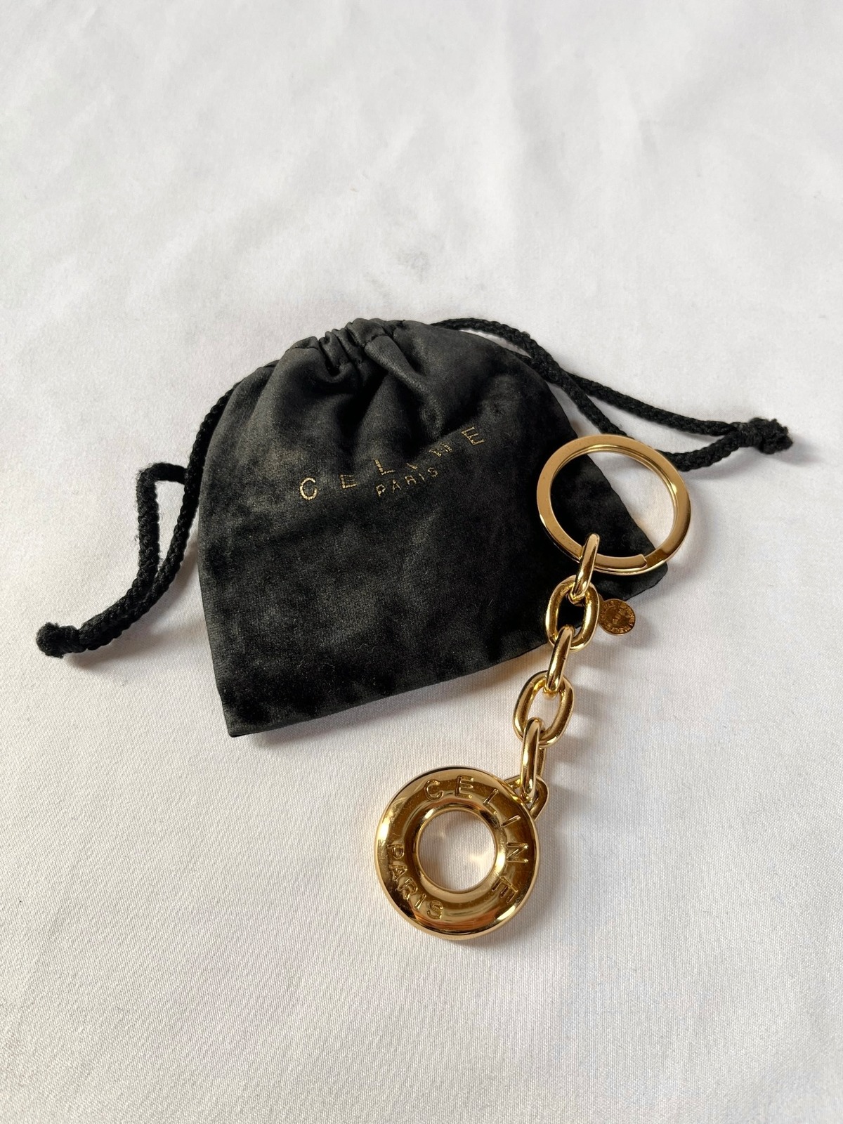 CELINE“Circle Logo” Gold Key Charm | CARBOOTS
