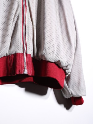 "Champion" reversible mesh × nylon hooded jacket