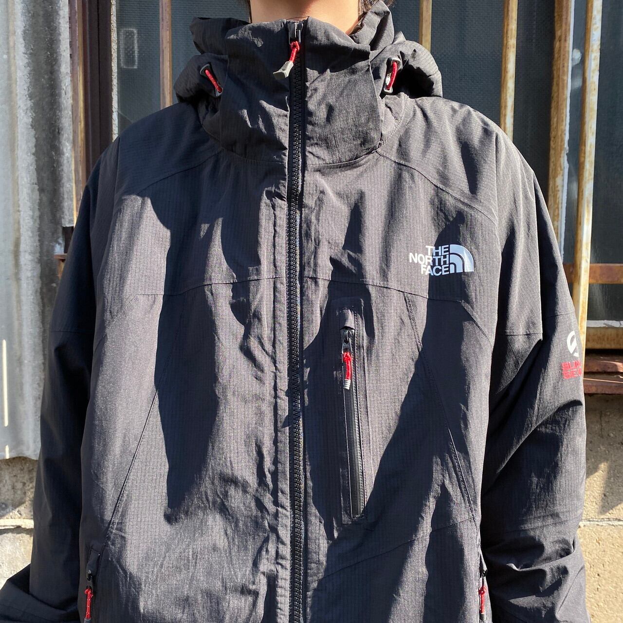 THE NORTH FACE ザ ノースフェイス HYVENT ALPHA PRIMALOFT ナイロンジャケット メンズM相当 古着 SUMMIT  SERIES 中綿入り フード着脱式 マウンテンパーカー ブラック【アウトドアジャケット】 | cave 古着屋【公式】古着通販サイト