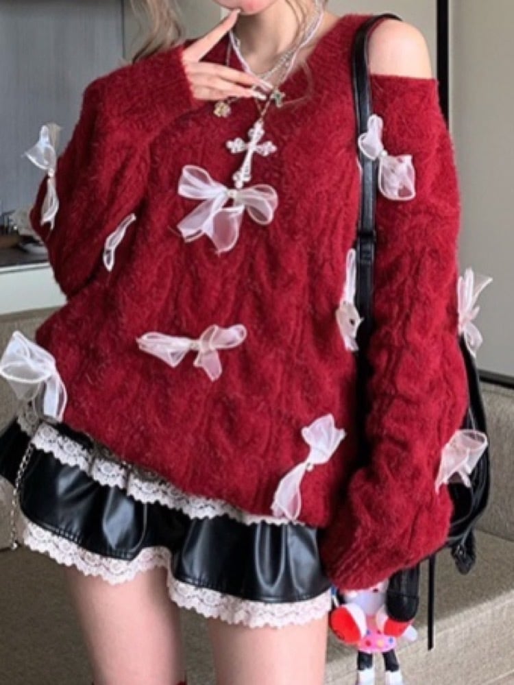 可愛さとセクシーさの絶妙バランス！ケーブル編みリボン付きニット