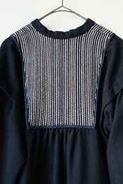Navy wool dress with woven yoke