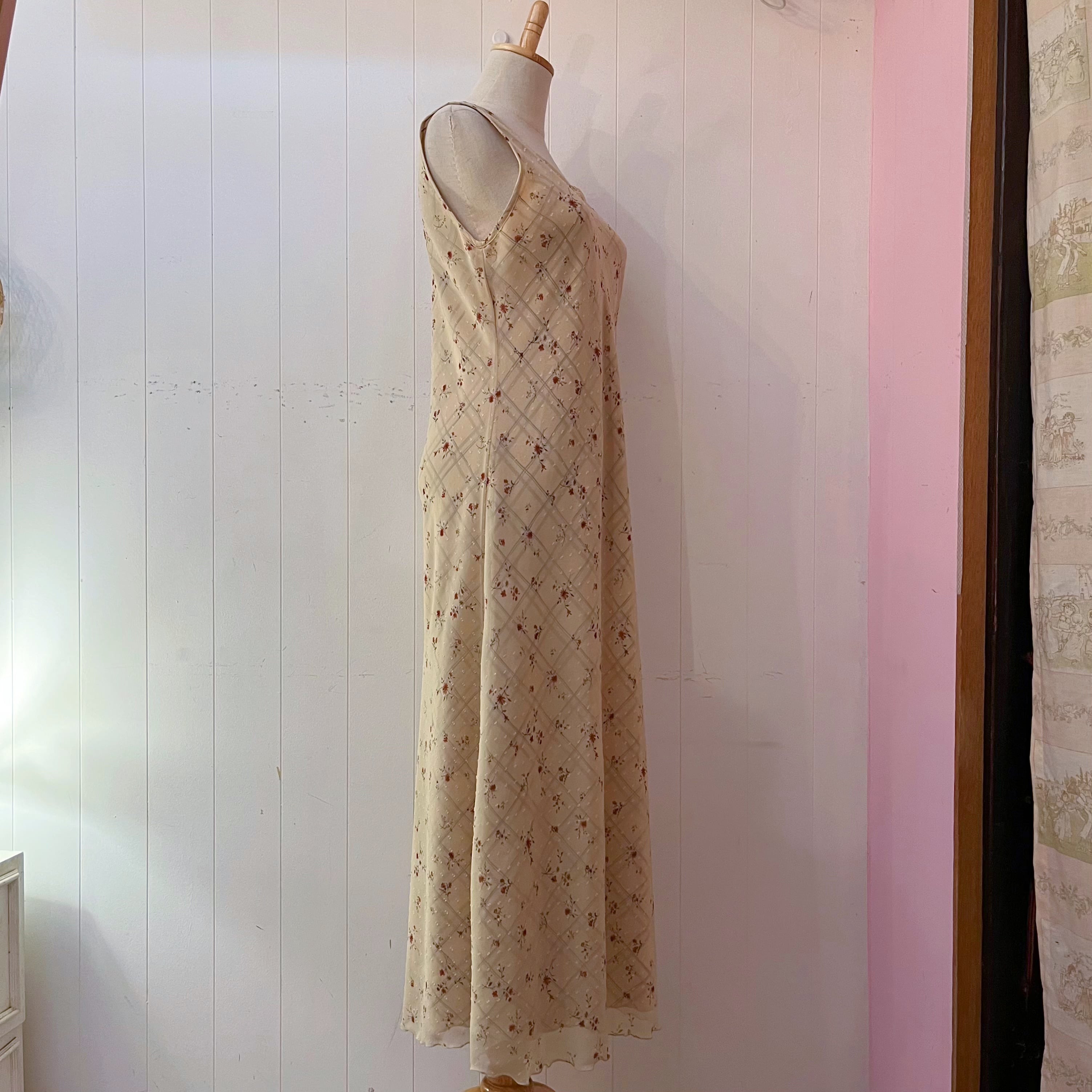 flower check sleeve less one-piece