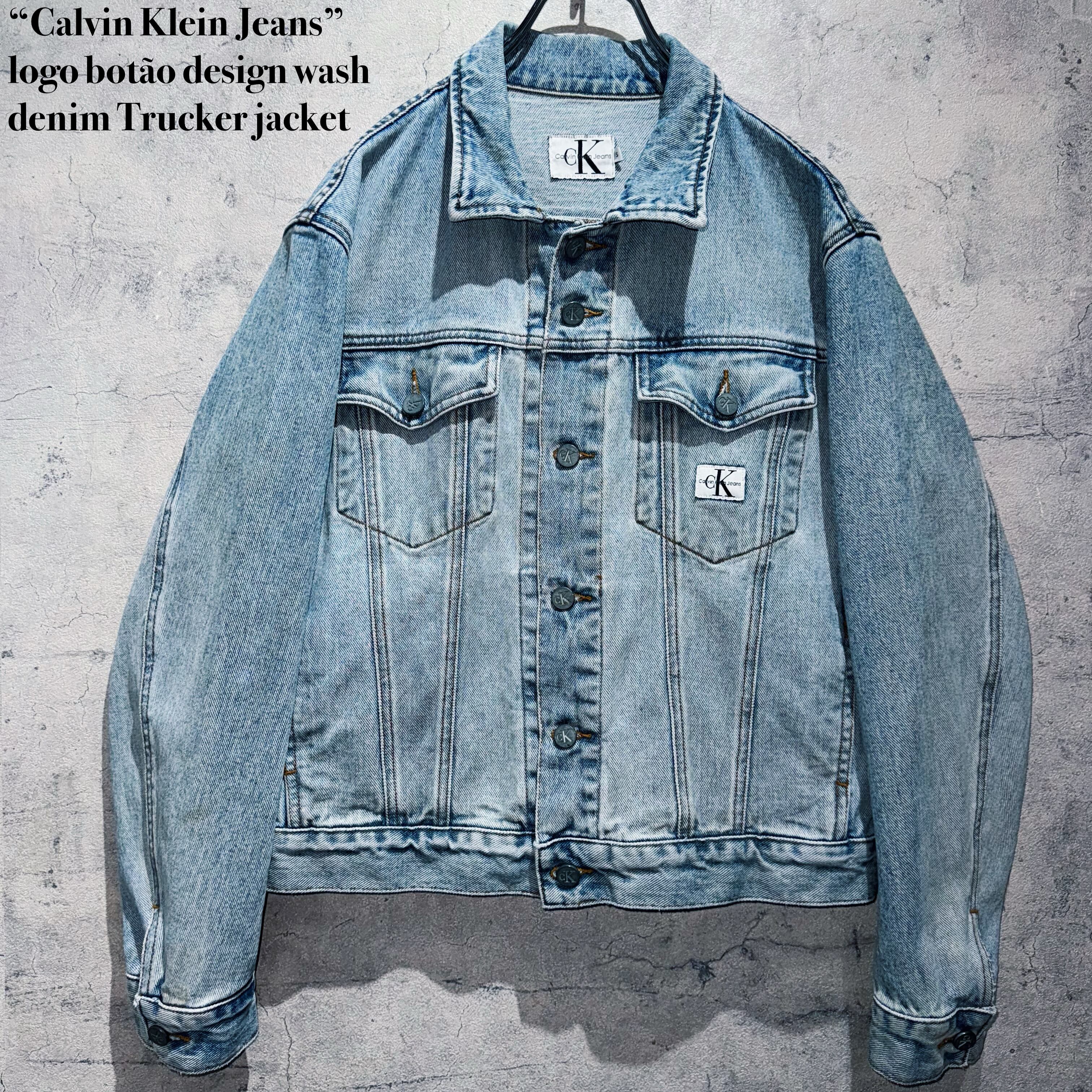 “Calvin Klein Jeans”logo botão design wash denim Trucker jacket