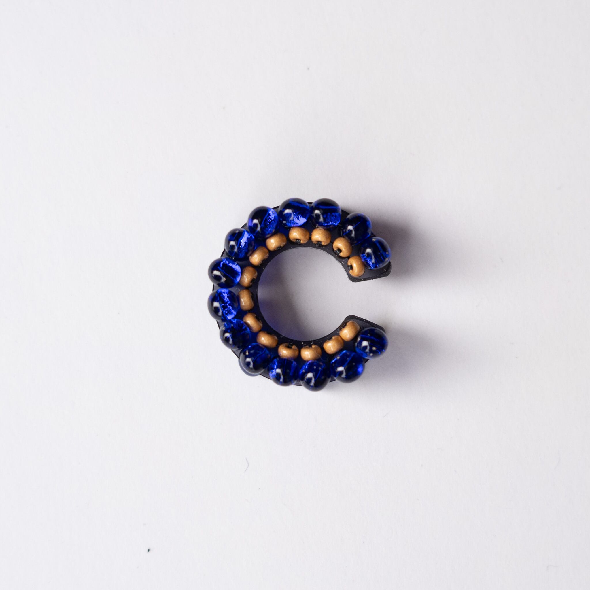 puzzle ring ear cuff [45]