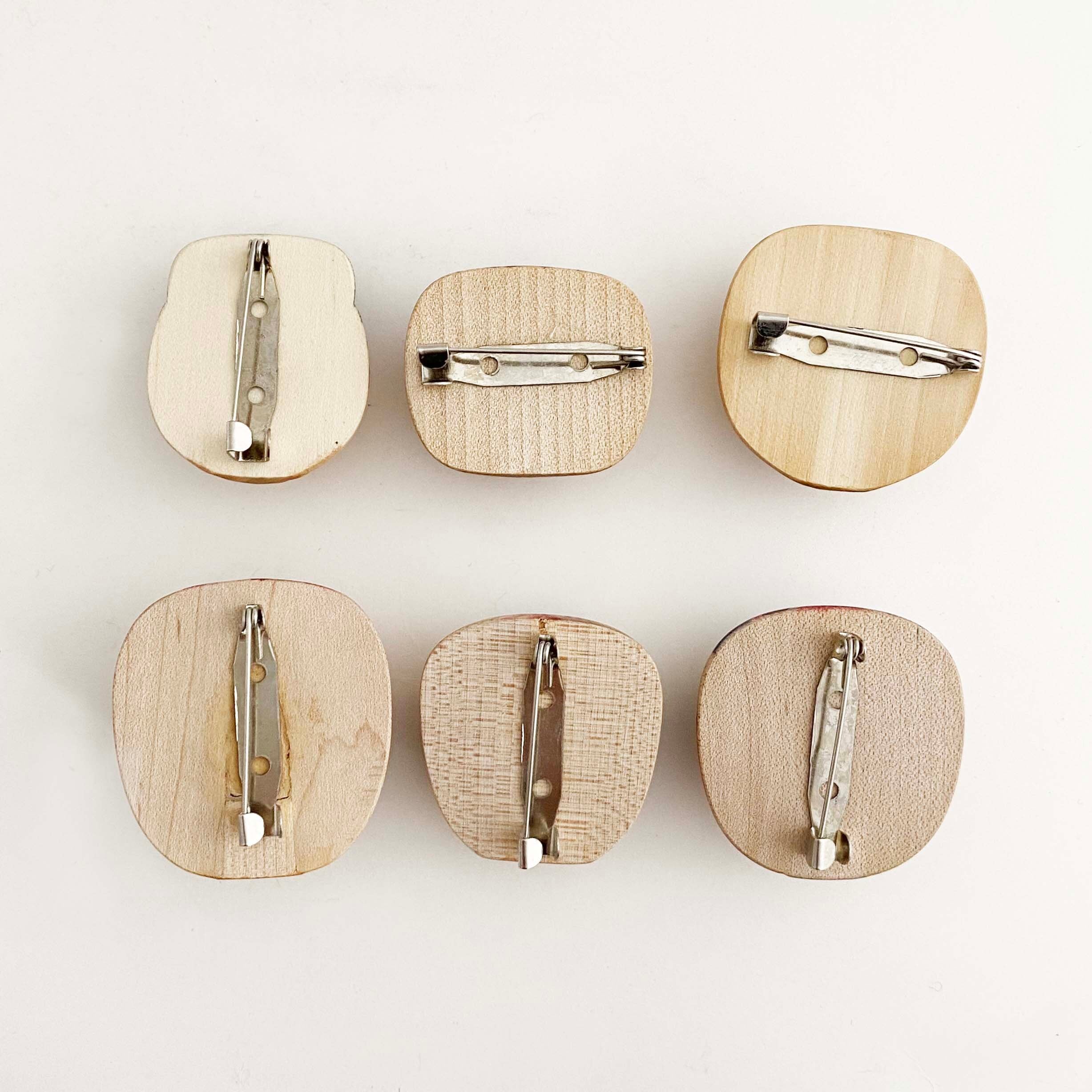 こけし顔バッヂ（小）