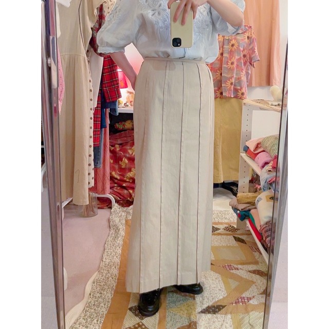 beige pleats side slit long skirt