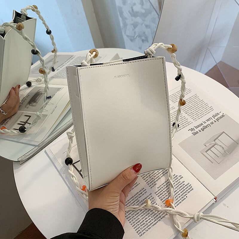 ニッチデザインレディースバッグ2020新しいトレンディなファッション織ショルダーバッグメッセンジャーバッグinsネット赤携帯電話バッグ Tiancai_Wing_Bag0887783