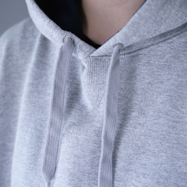 "Champion" light gray color over silhouette sweat parka