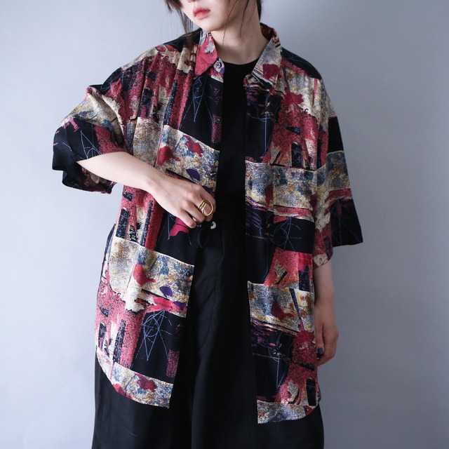 "GOOUCH" psychedelic full art pattern over silhouette h/s shirt