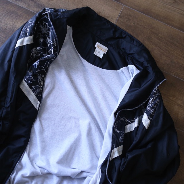 flower art pattern over silhouette nylon blouson