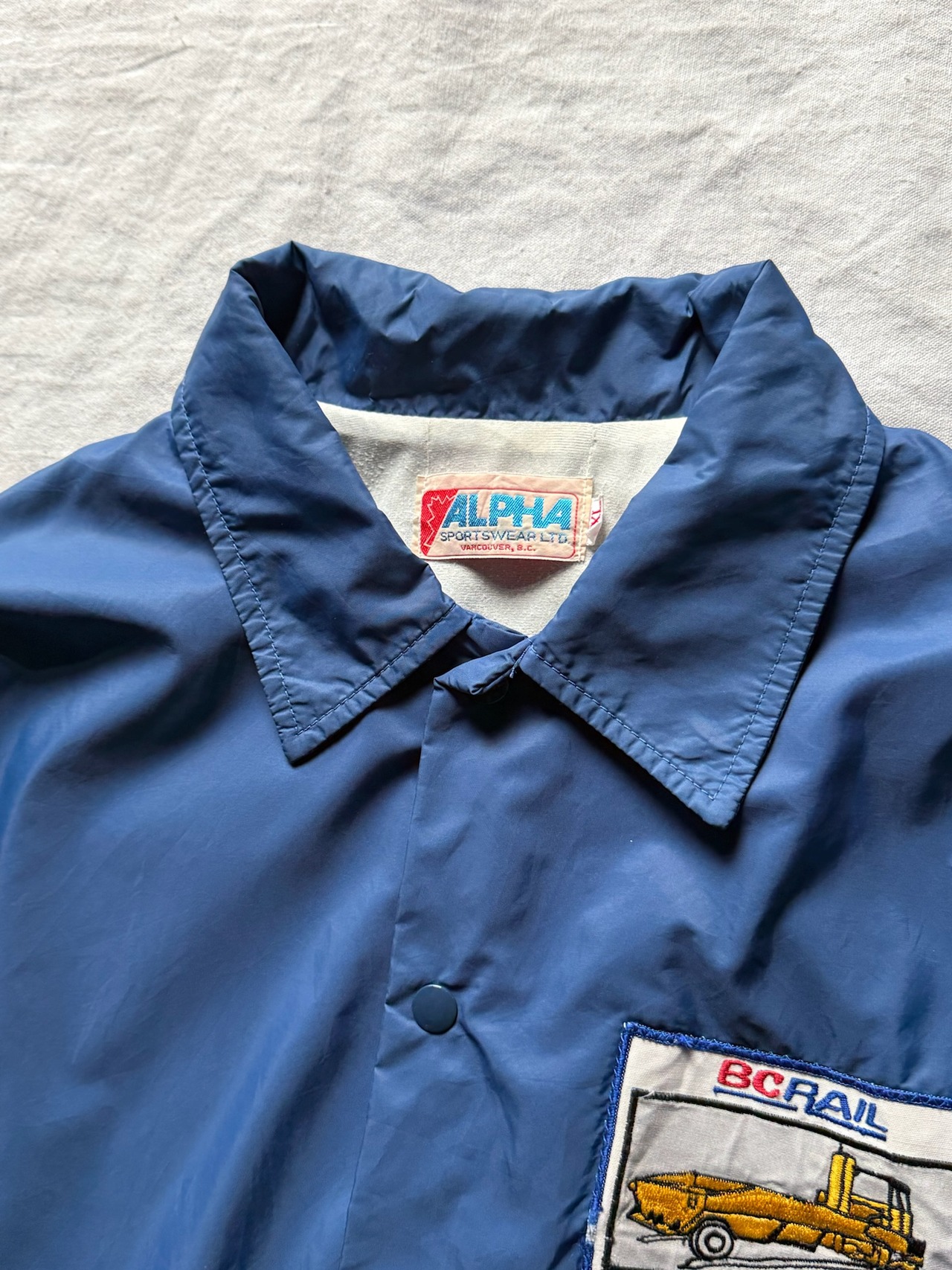 Pale blue nylon coach jacket