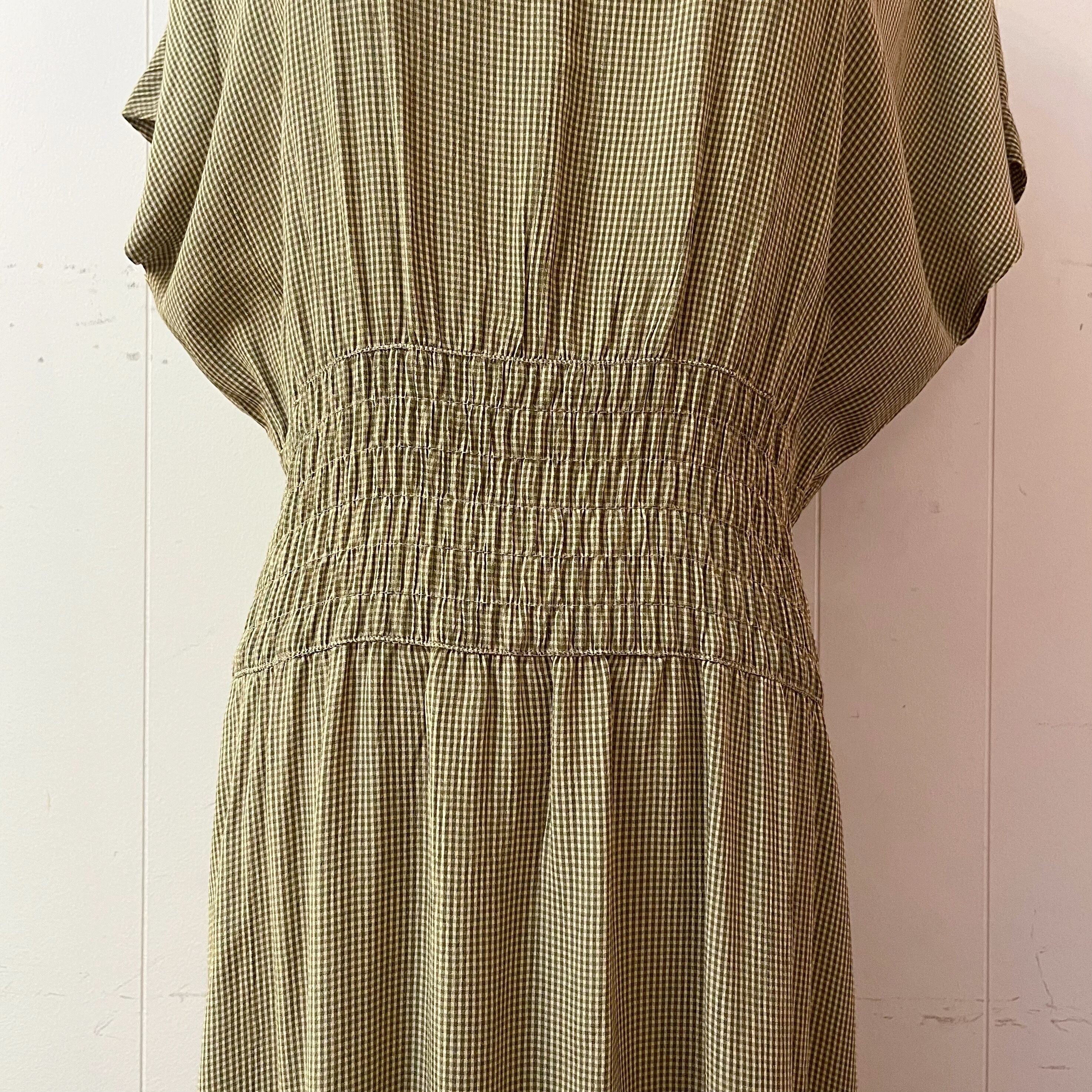 green check back button one-piece