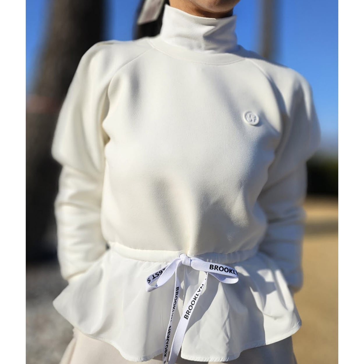 レタリングリボン ペプラムプルオーバー