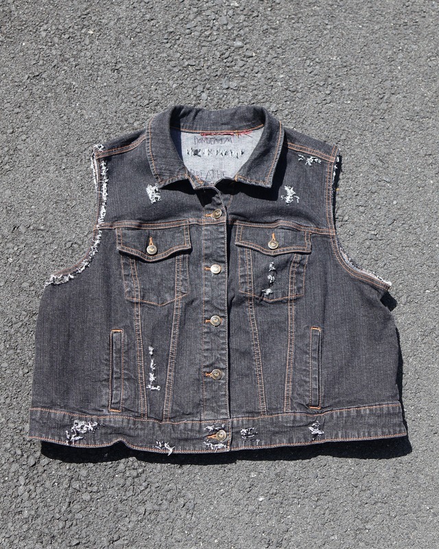 Short length destroyed denim vest