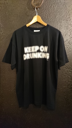 A PUZZLING HOME "KEEP ON DRUKING TEE" Black Color