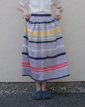 pale tone multi color border skirt