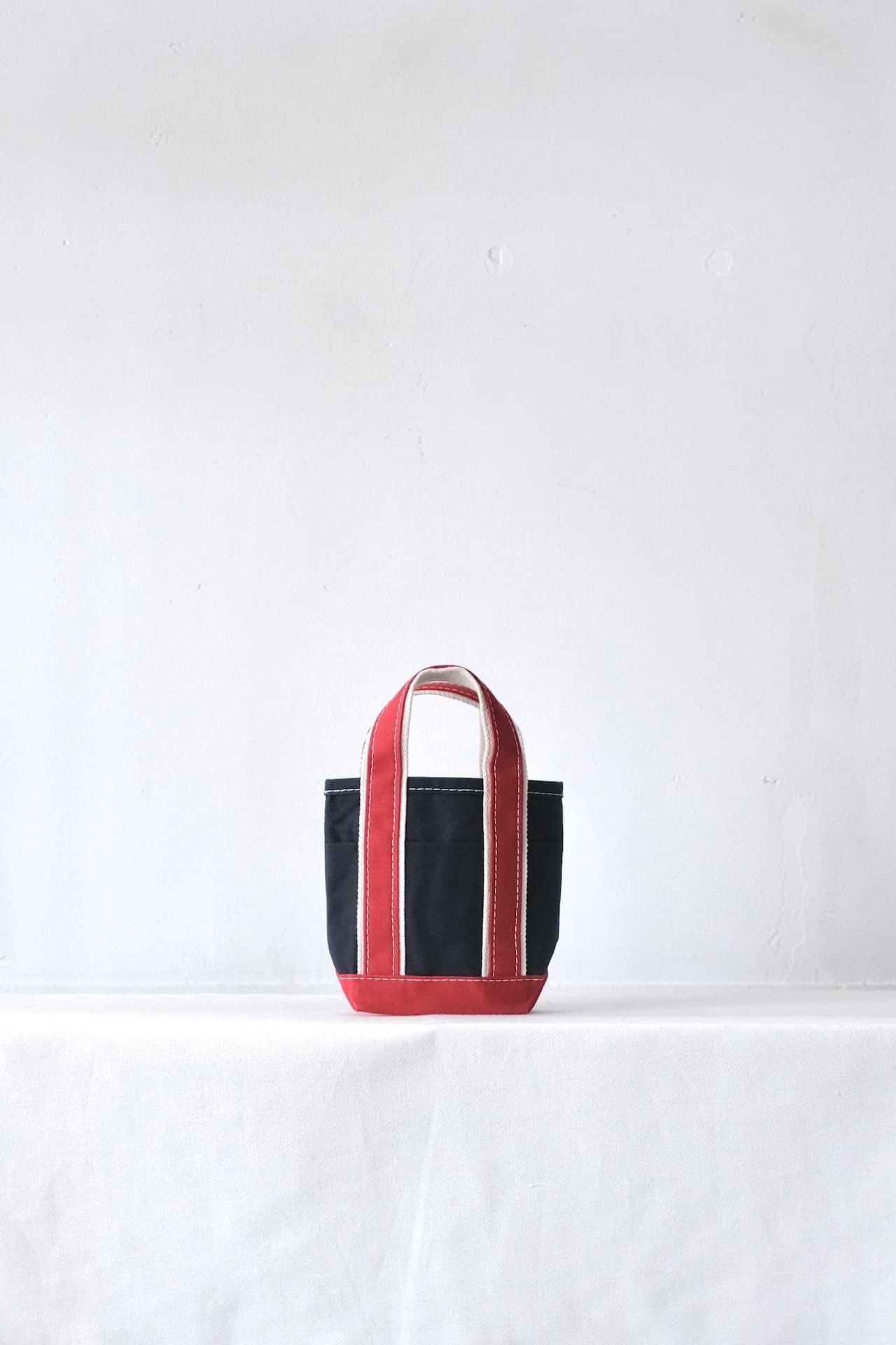 "Order Event" This is a(n) Base Field Tote/Tall S Navy/Red,Navy/Forest Green