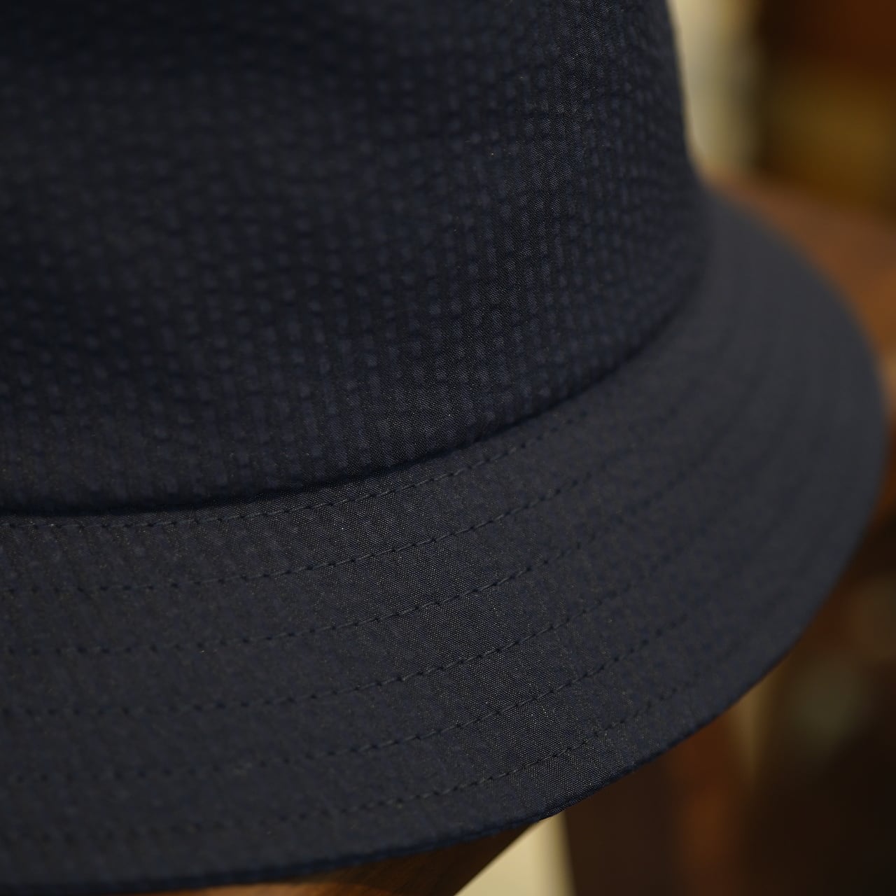 KUON（クオン） CIRCLE別注 ネイビーシアサッカー バケットハット