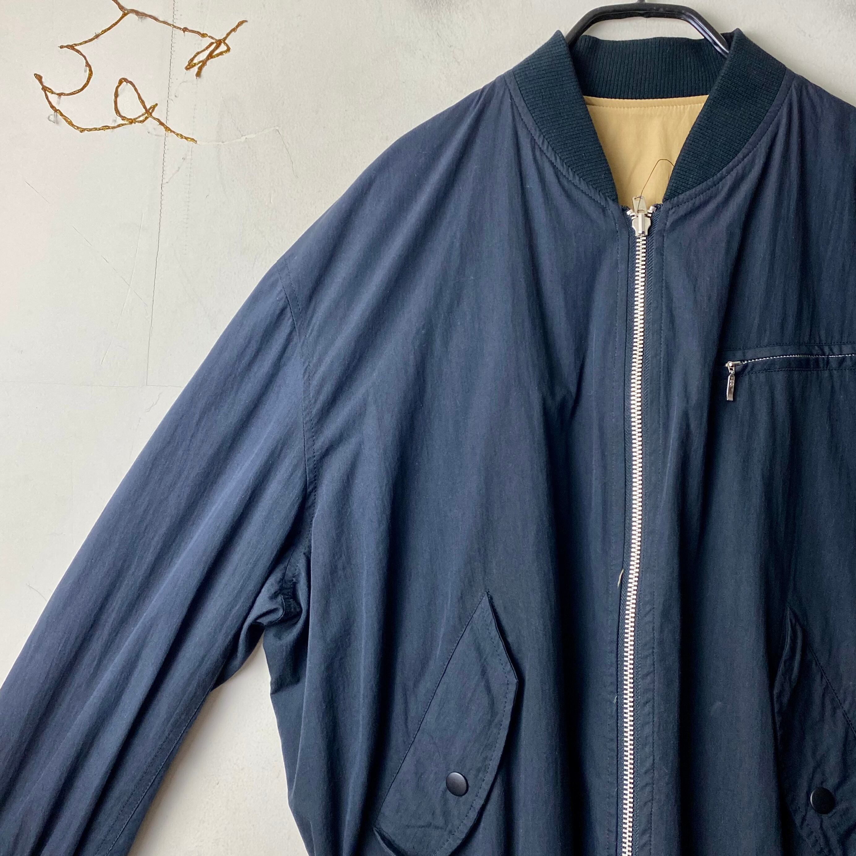 old Mr.JUNKO logo print reversible bomber jacket | NOIR ONLINE