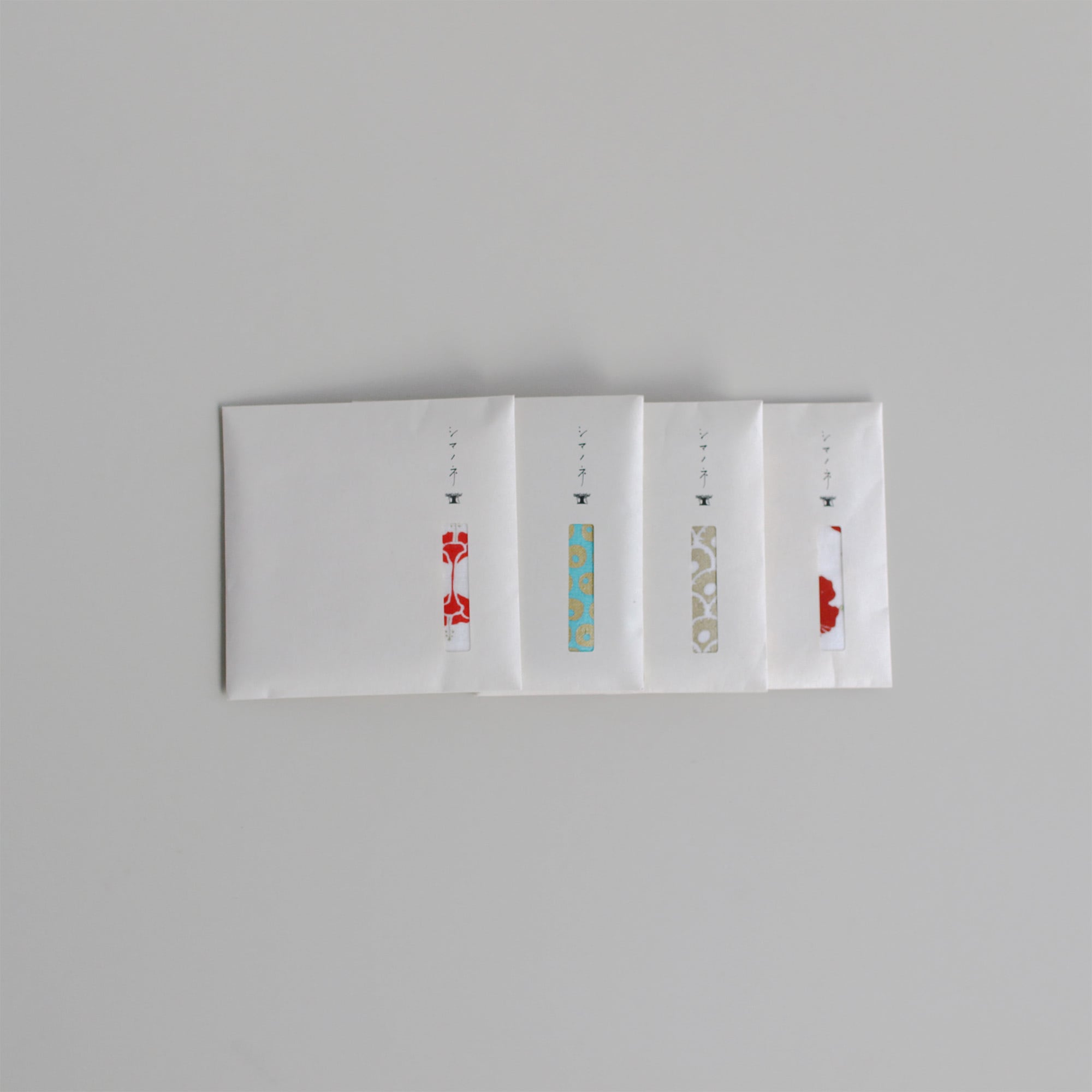 シマノネ｜タオルハンカチ / シーサーミンタマー | 装いの庭