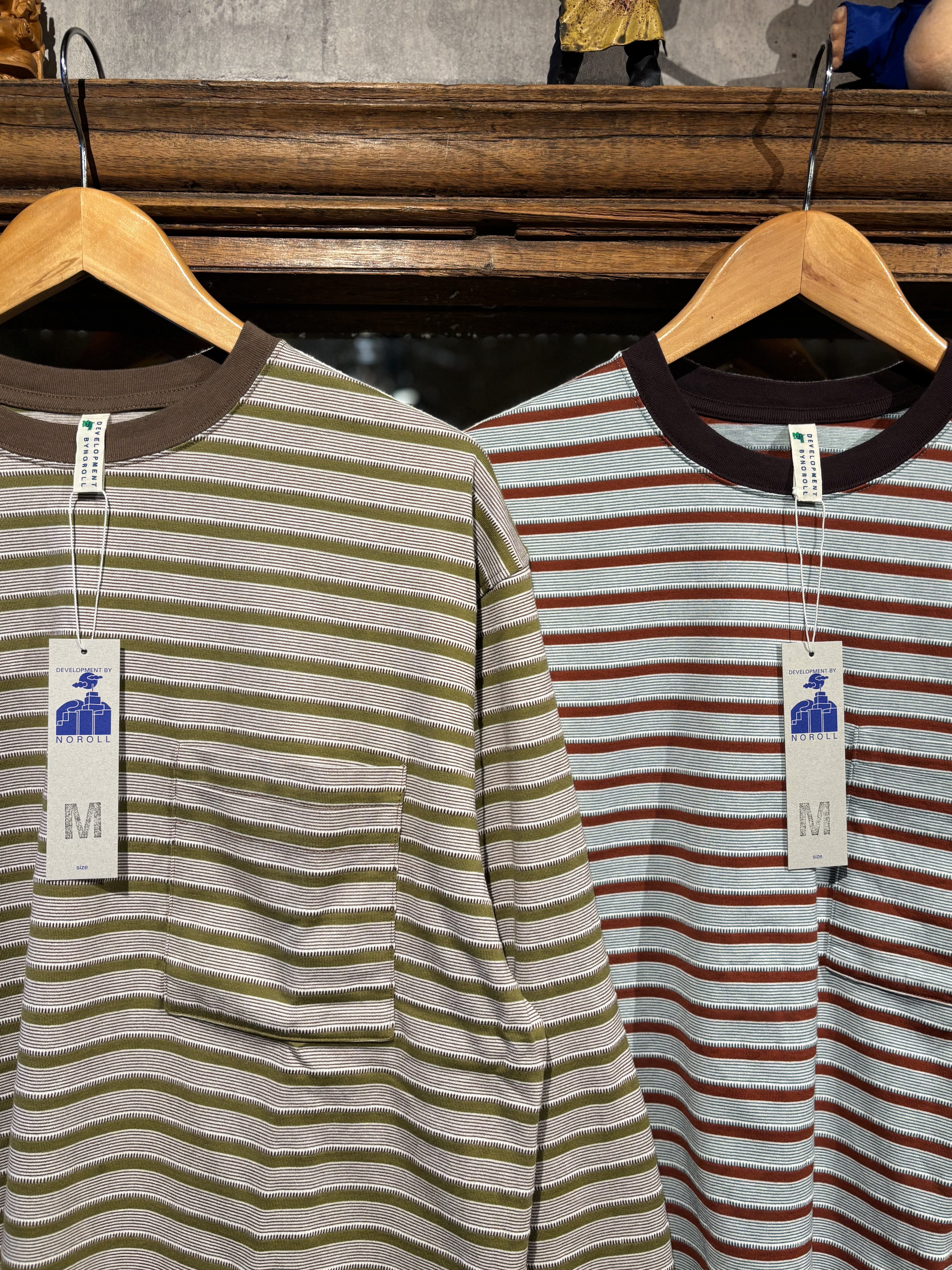 NOROLL UNEVENNESS L/S TEE GREEN ORANGE / ノーロール Tシャツ