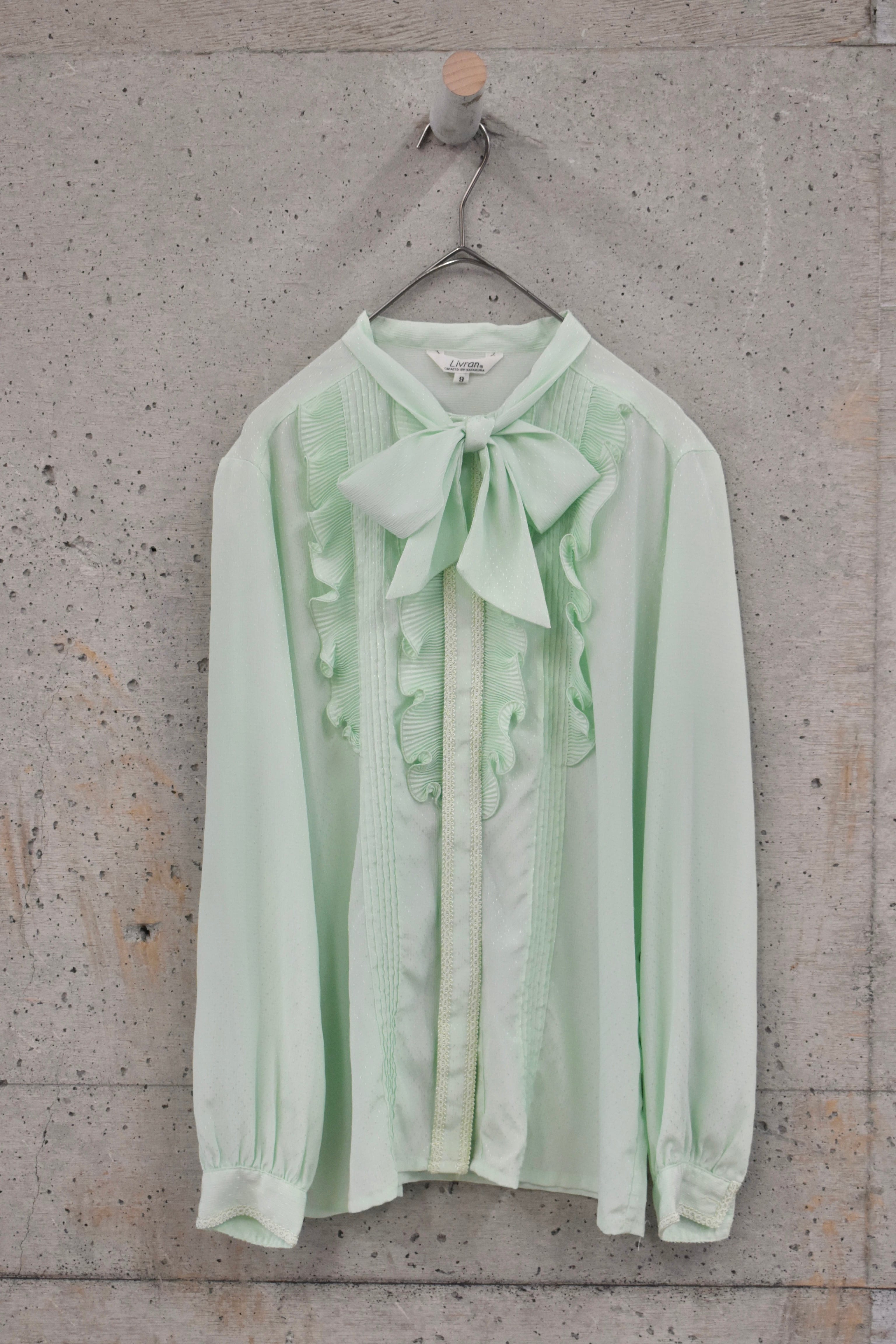 Jacquard blouse with ribbon tie