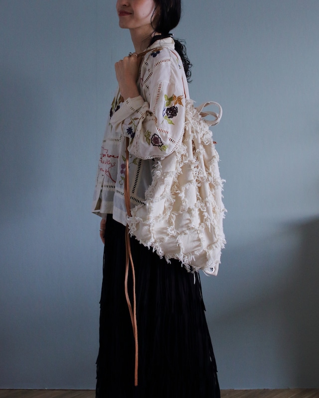 Cotton fringe Knapsack.