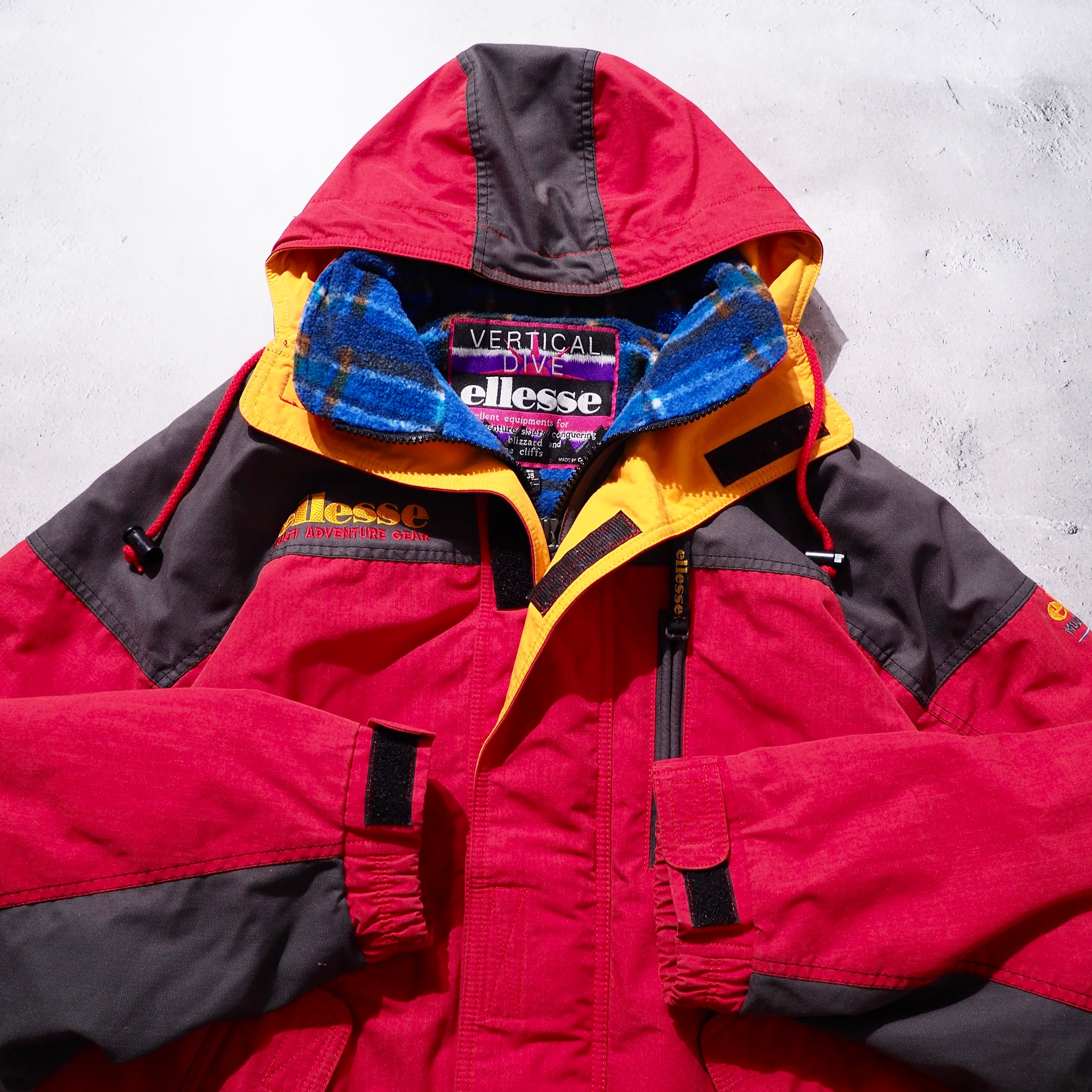 1980 - 90s ” ellesse ” Good multi color full zip vintage nylon jacket Parker