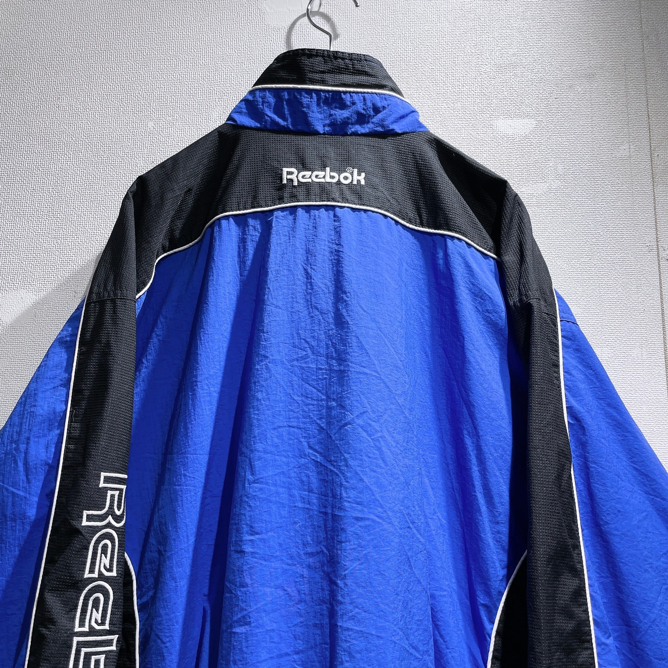 1990s ” Old Reebok ” Big vector logo Embbossed vintage Track jacket