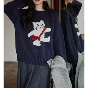 cat's casual chic and atmospheric sweater