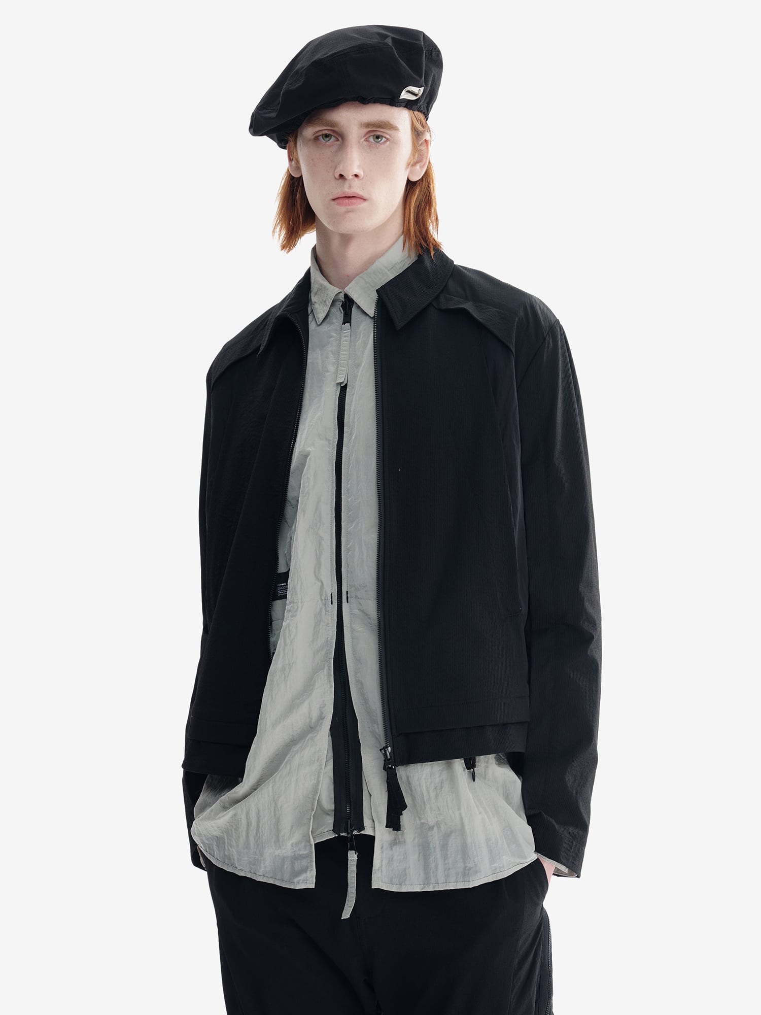 SQUD デコンストラクトショート丈レーシングジャケット | テックウェア  