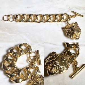 vintage JUNKO SHIMADA gold color metal chunky bracelet with “tiger head”