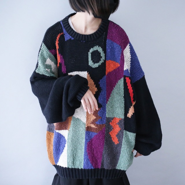 black base colorful art pattern over silhouette knit