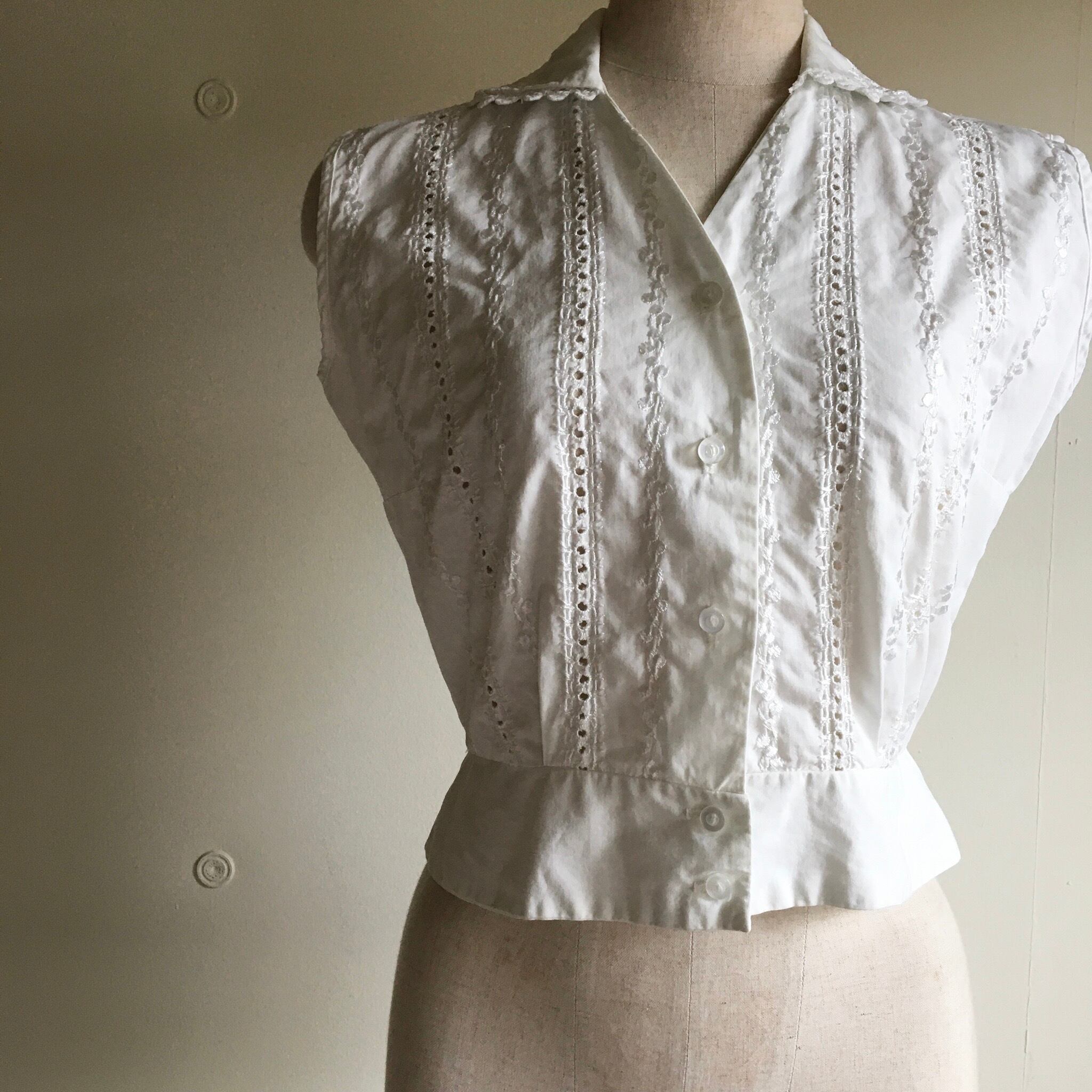 sleeveless lace blouse