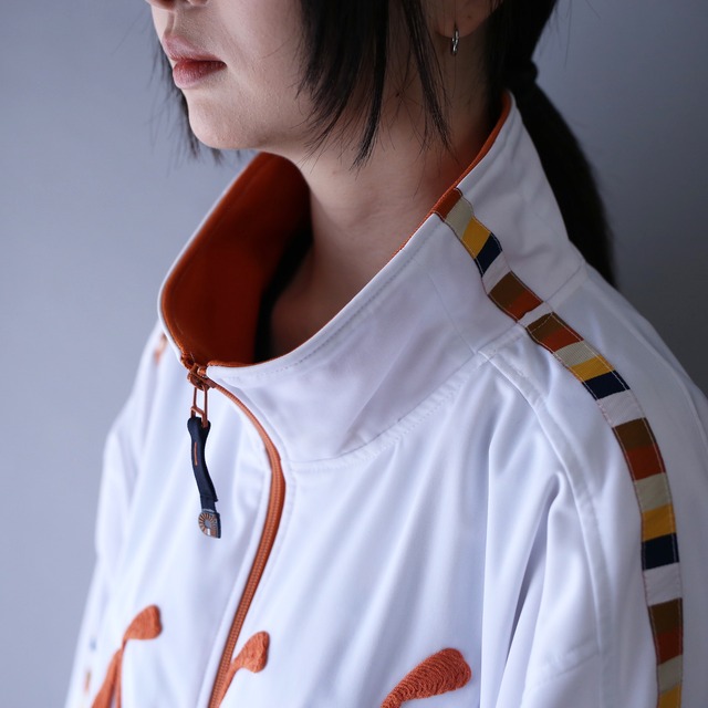 "刺繍" and wappen and colorful taping design over silhouette track jacket
