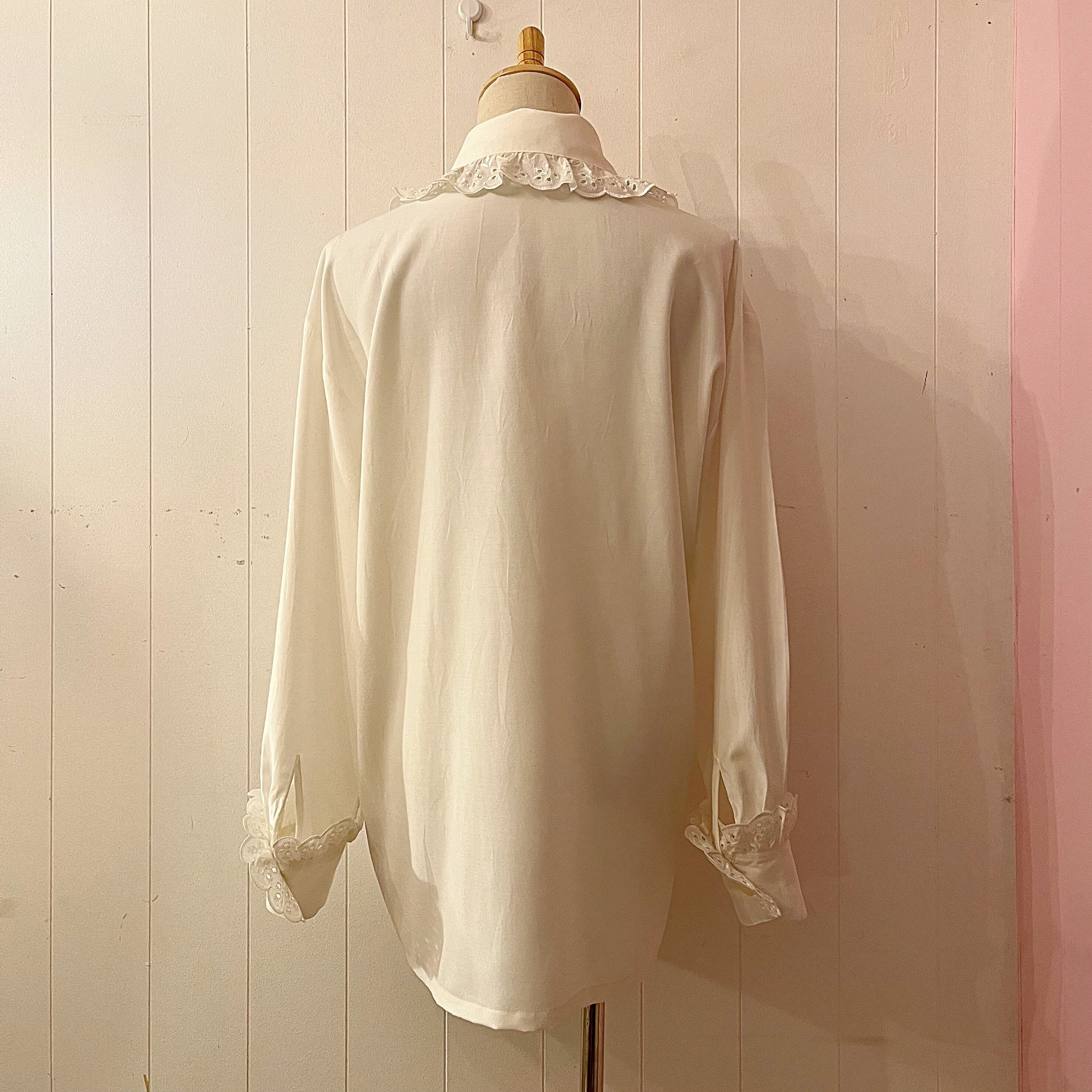 big frill cuffs white blouse